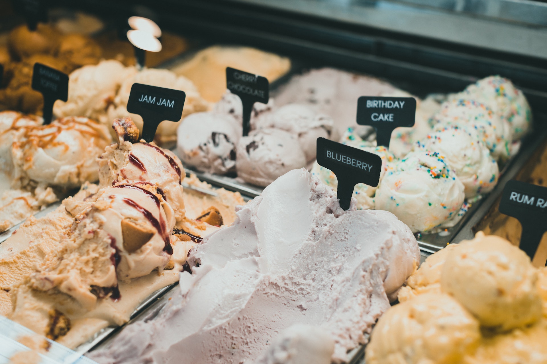 Containers of ice cream on display